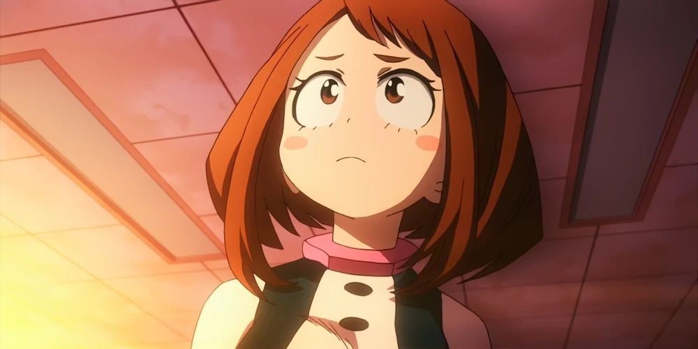 Ochaco Uraraka at school in her hero costume looking worried in My Hero Academia.